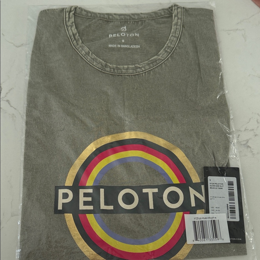 Peloton Olive Green Tee with Gold and Multicolor Ring Logo